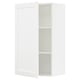 A white SEKTION kitchen cabinet with a door partially open, revealing two shelves inside.