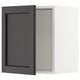 SEKTION: charcoal cabinet door with bevel, ash wood texture.