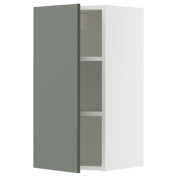 An open white wall cabinet with a gray-green door. Modern, sleek design with adjustable shelves.