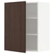 Wooden brown cabinet door open revealing white shelves on white base.