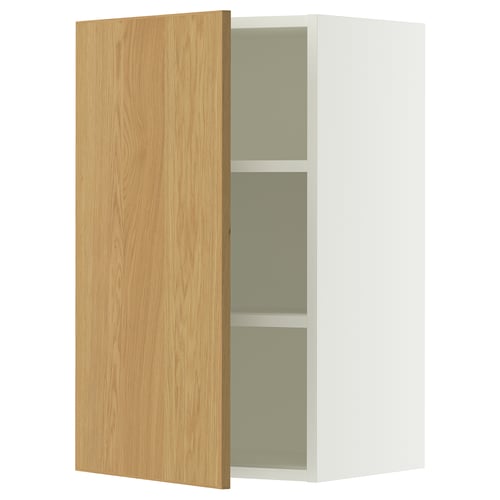 A white wall cabinet with a light oak door, featuring two adjustable shelves. It has a modern and clean design, suitable for kitchens.