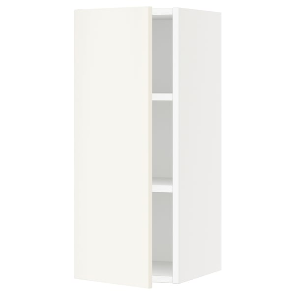A sleek, white SEKTION wall cabinet with a modern design, featuring two adjustable shelves and smooth, closed doors.