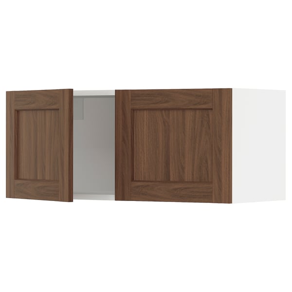 SEKTION kitchen cabinet with walnut-brown doors, white frame, and dampers.