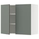 A modern grey-green cabinet with two doors from IKEAs SEKTION kitchen system. It has a sleek, square shape with adjustable shelves inside.