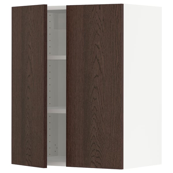 A SEKTION wall cabinet with dark brown sinarp fronts and a white interior. It has an adjustable shelf and snap-on hinges.