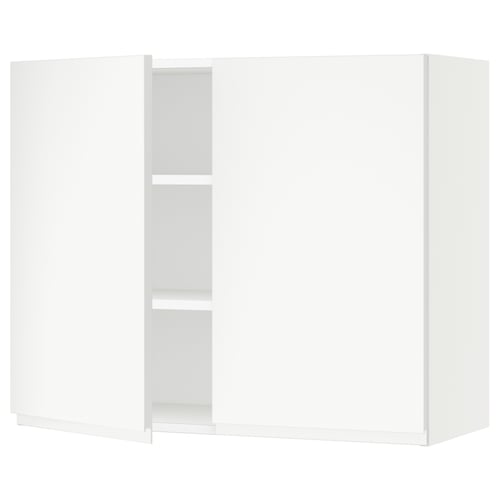 A white SEKTION kitchen wall cabinet with minimalist design and adjustable shelves.