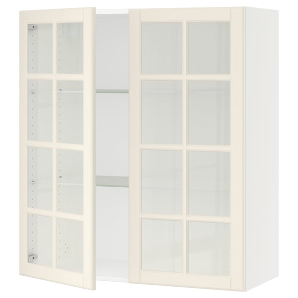 SEKTION kitchen unit with off-white glass doors and adjustable shelves.