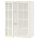 A white SEKTION kitchen unit with glass doors. It has a traditional design, featuring bevelled edges on the glass doors and adjustable shelves.
