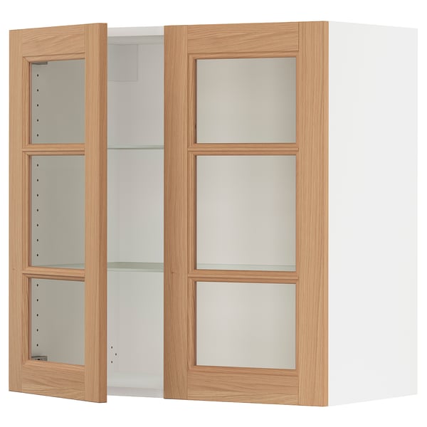 A light brown wooden cabinet with glass doors. It three shelves inside, and the frame is sturdy and modern.