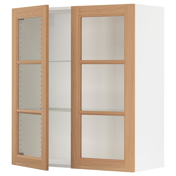 SEKTION kitchen cabinet with oak glass doors, white and wood frame.