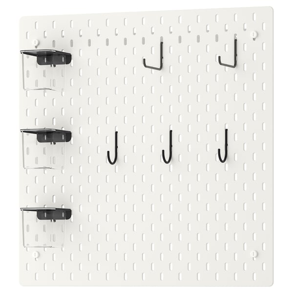 SKÅDIS white pegboard with three hooks and three plastic containers in black and clear, organised in a row.