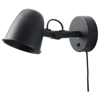 A black SKURUP wall lamp with an adjustable arm and shade, made of steel, for directional lighting.