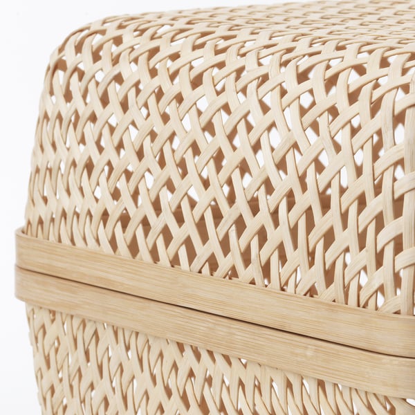 Wicker basket woven from dried bamboo, natural beige colour, tightly interlaced pattern for durability.