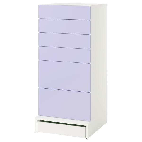 A white and lavender SMÅSTAD chest of drawers with five drawers. Its perfect for storing childrens clothes in a nursery.