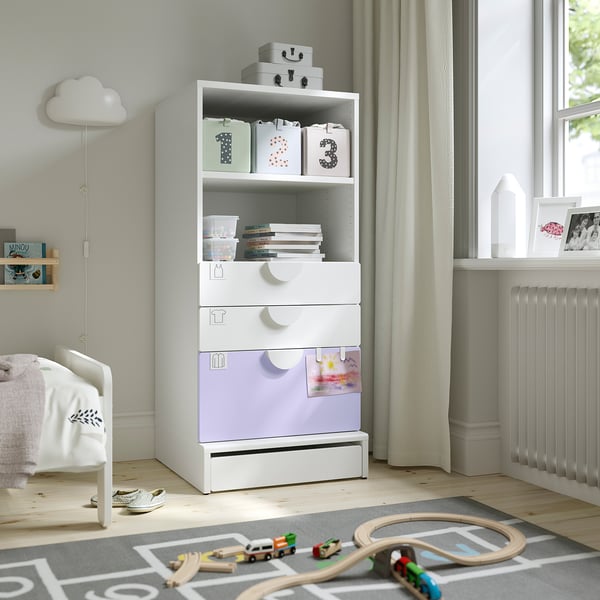 Childs room with SMÅSTAD bookcase, toys, and cloud lamp.