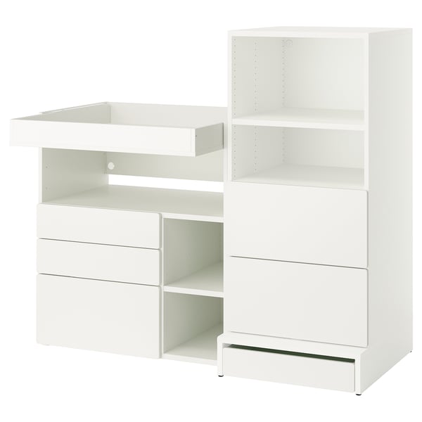 White ikea SMÅSTAD baby changing table and storage unit with drawers and shelves.