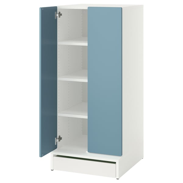 An ikea SMÅSTAD cabinet with blue doors and white shelves, standing on a white base. It has a rectangular shape with a simple, modern design.