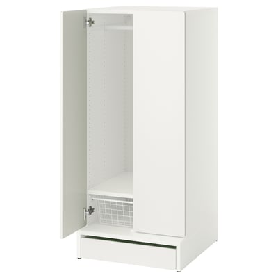 A white SMÅSTAD wardrobe for children, with one door open, revealing adjustable shelves and a soft-closing hinge.