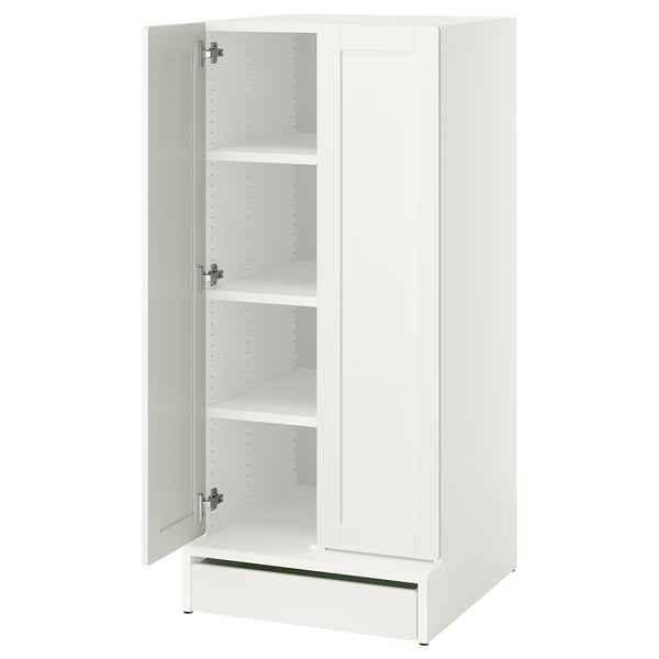 A white SMÅSTAD cabinet with one door open, revealing three shelves and a soft-close hinge.