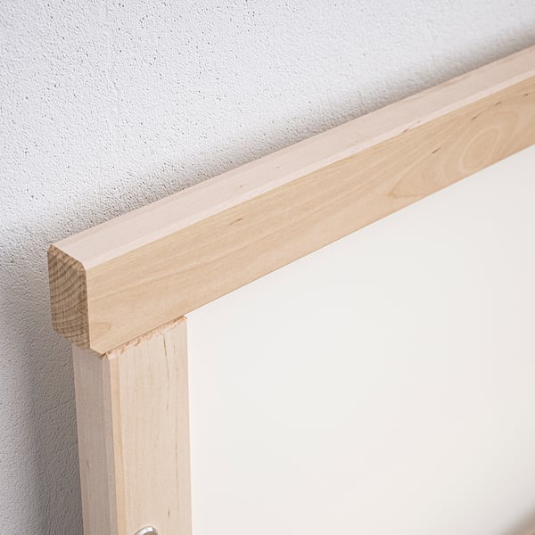 Close-up of well-crafted wooden bed frame corner, showcasing sturdy beech joints.