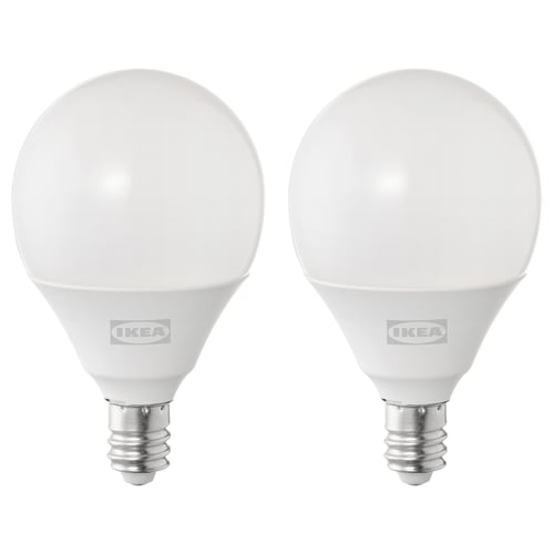 Two ikea SOLHETTA led bulbs, white, round, with metallic base, side by side.
