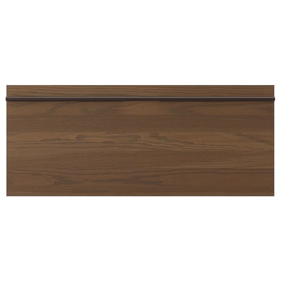 A dark brown wooden panel with a sleek handle.