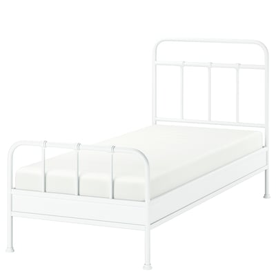 A white STJÄRNÖ bed frame with a curved headboard and footboard, made of powder-coated steel, offering a classic and sturdy design.