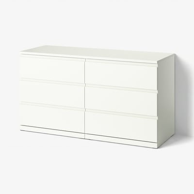 Modern white chest of drawers, six drawers with smooth lines, safe with anchoring feature.
