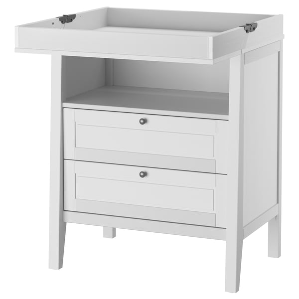 White SUNDVIK changing table with 2 drawers and open shelf.