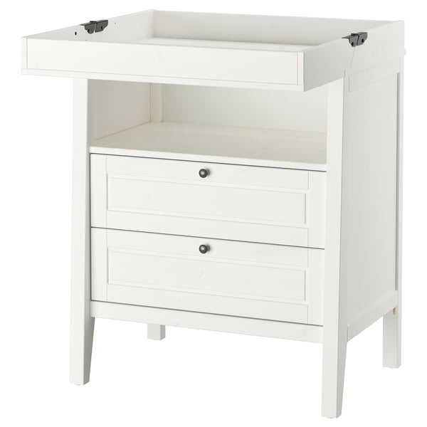 White ikea SUNDVIK changing table with drawers and flat surface.