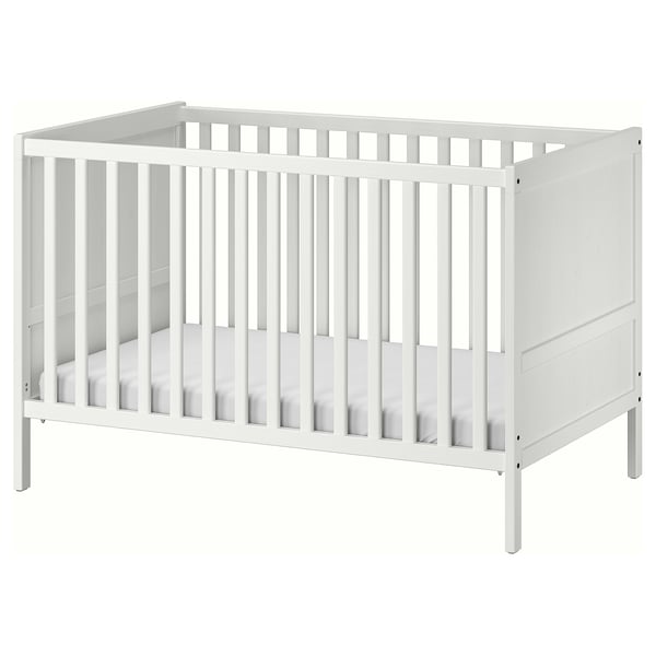 White SUNDVIK baby cot, clean design with wooden slats, ideal for infant sleep.