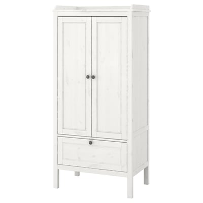 A white SUNDVIK wardrobe with wooden panels, two doors, and one drawer, suitable for various ages.