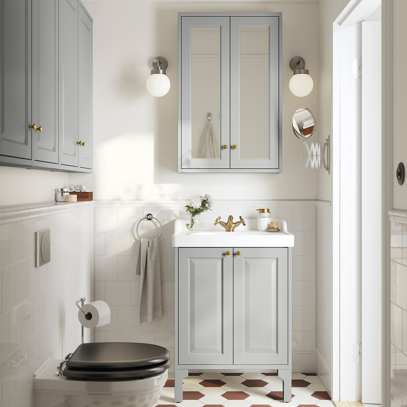 Modern light grey bathroom: wall-mounted mirror cabinet, vanity, toilet, patterned floor tiles.
