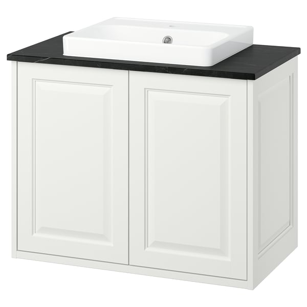 TÄNNFORSEN white bathroom cabinet with black countertop and square basin.