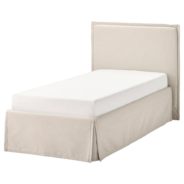 A neutral-colored, beige upholstered bed frame with a padded headboard, featuring a minimalist and modern design.