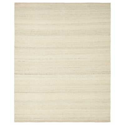 A beige, rectangular wool rug with a subtle texture.