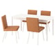 Modern dining set with white table and brown leather chairs.