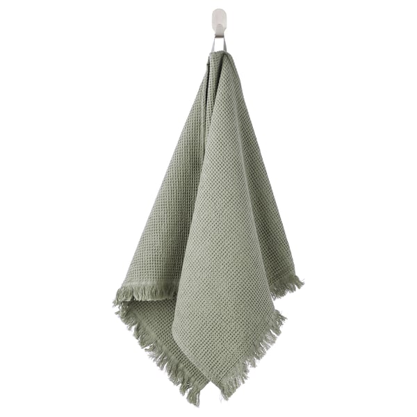 VALLASÅN towel: light green, textured diamond weave, fringe edges, soft, absorbent, plant-dyed.