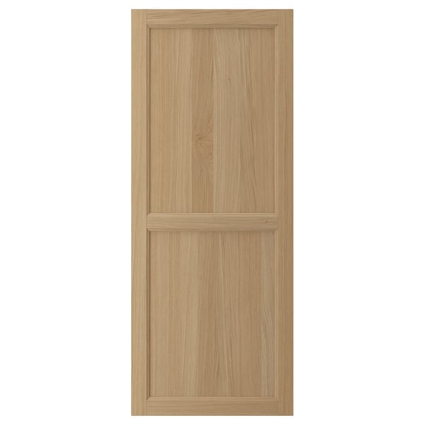 VEDHAMN natural oak kitchen cabinet door, solid oak frame with veneer panel, rectangular shape.