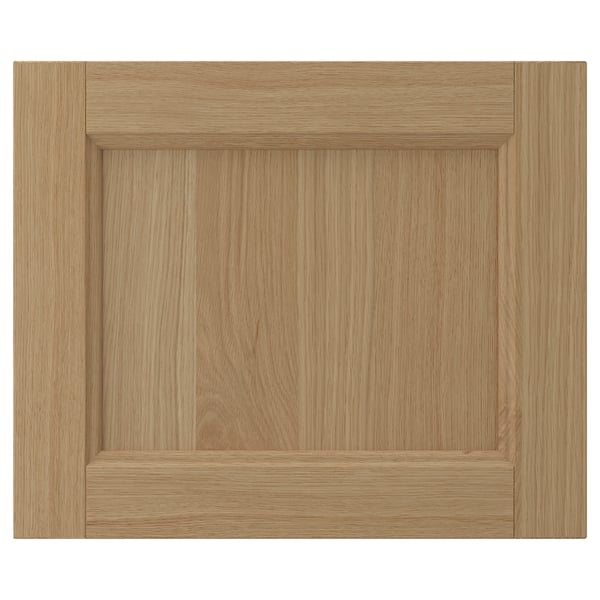 VEDHAMN light wood cabinet door with natural oak grain, solid frame, and square edges.