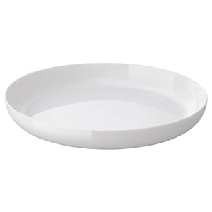 A white, round, opaque glass plate. It has a smooth, elegant design and is both dishwasher and microwave safe.