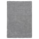 A grey shaggy area rug named VOLLERSLEV, made from recycled polyester and polypropylene, rectangular and soft-textured.