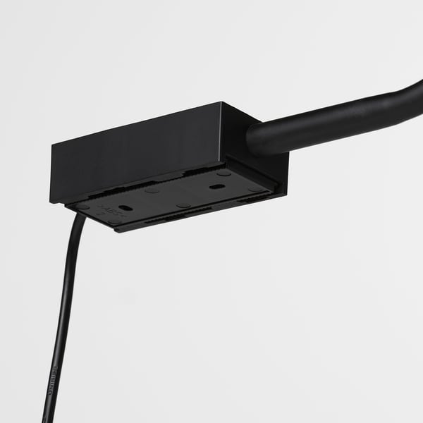 Sleek, black, wall-mounted lamp with flexible neck, quality materials, minimalist design.