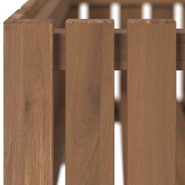 Close-up of wooden slats on a sturdy plant box, showcasing the natural grain and finish.