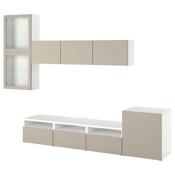 Modern white BESTÅ tv unit with storage, glass doors and drawers.