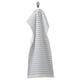 A white BROKGINST towel with blue stripes, hanging, featuring waffle and terry textures.