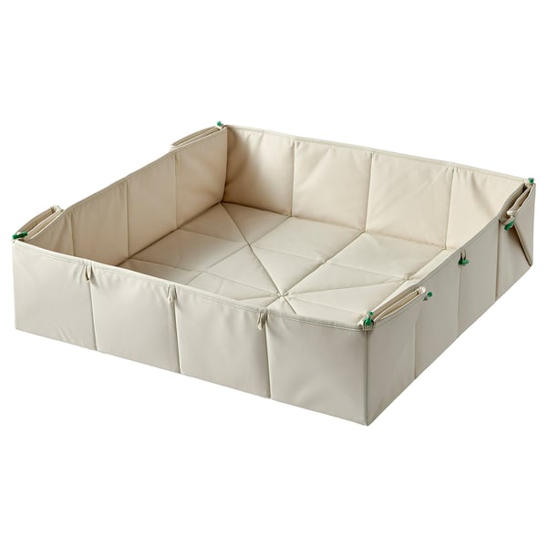 A beige GREJSIMOJS storage box, square-shaped, with foldable design and green zip pulls.