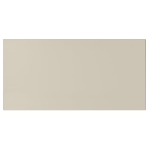 A rectangular, beige HAVSTORP kitchen cabinet with smooth, lacquered fiberboard surfaces, offering a modern, neutral design.