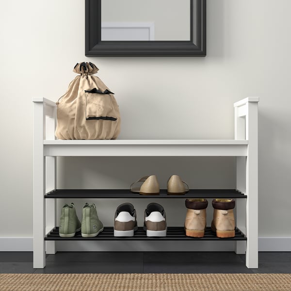 Shoe rack bench with 7-pair capacity and traditional design, ideal for entryways.