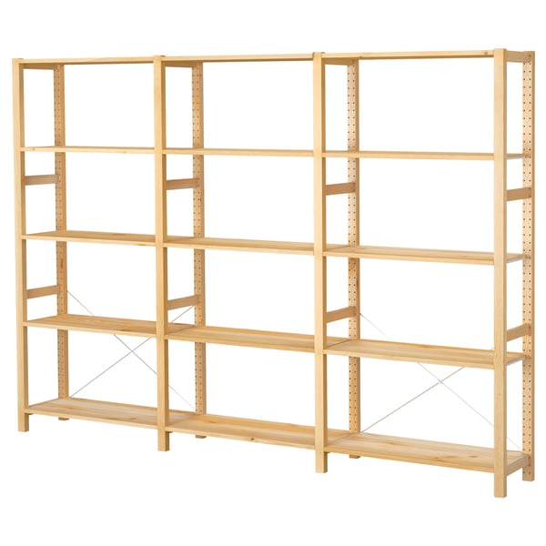 IVAR light-colored wooden shelving unit, multi-tiered, sturdy, functional design.